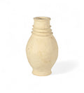 A handcrafted beige papier mache planter with a smooth finish.