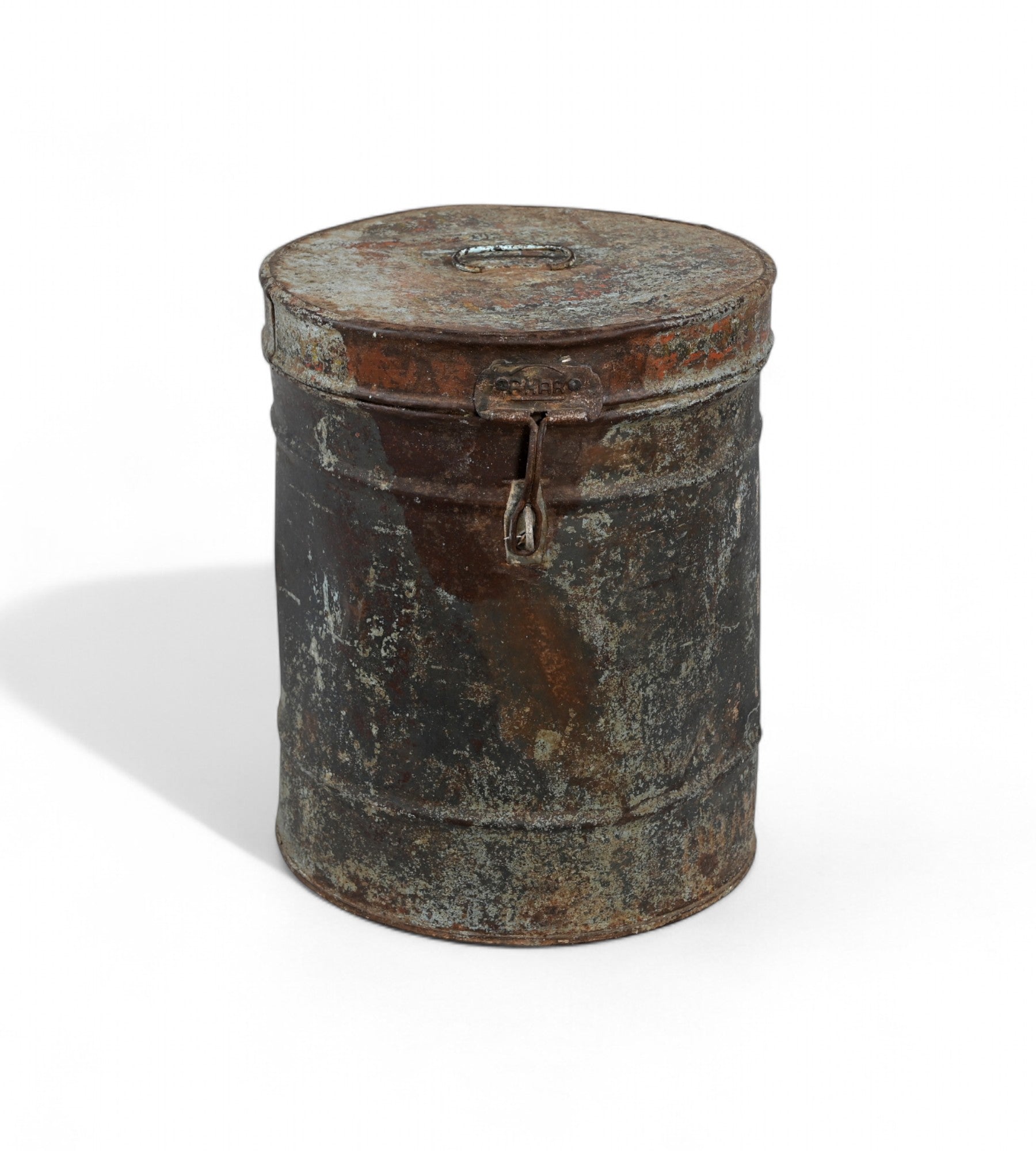Rustic vintage iron tanki box with a clasp, showing signs of wear and patina.