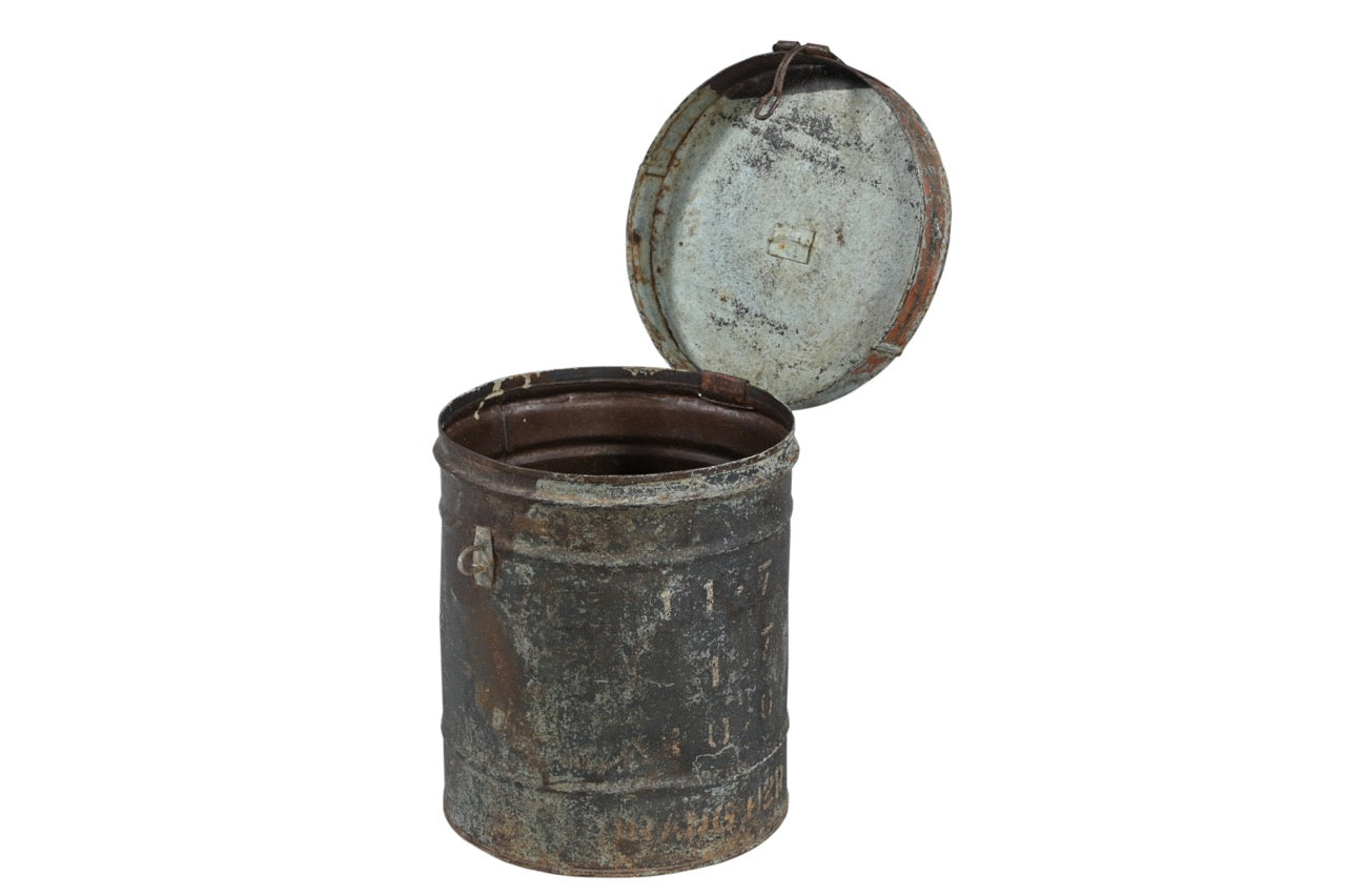 Rustic vintage iron tanki box with a clasp, showing signs of wear and patina.