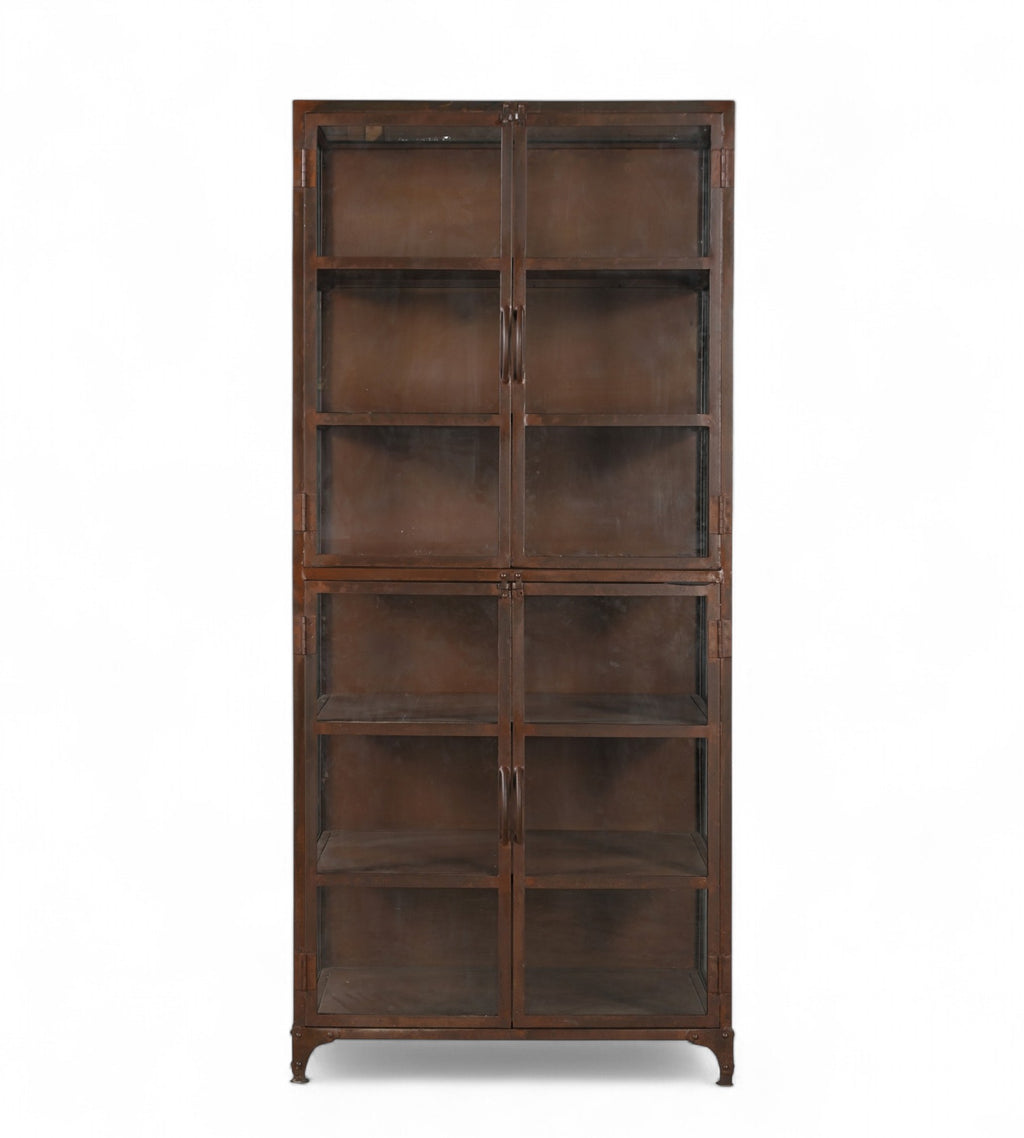 A vintage iron glass display cabinet with multiple shelves and four front glass doors.