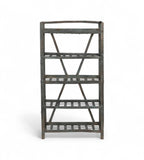 A vintage iron rack with five shelves featuring a blue grey patina and lattice style type shelves.