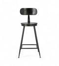 A black iron bar stool with a round mango wood seat and an ergonomic backrest, with visible wood grain and welds.