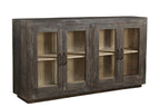 A mango wood sideboard with four glass fronted doors and a black and lime wash finish.