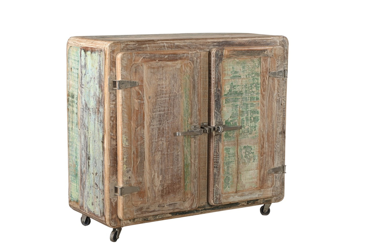 Vintage Indian reclaimed wood side cabinet with iron latches and wheels, featuring a faded multi-coloured patina.
