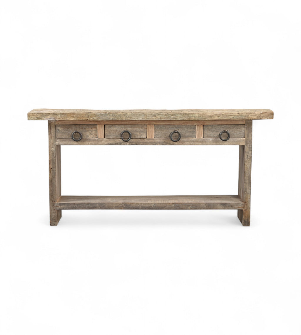 A rectangular recycled wood console table with four top drawers and a long bottom shelf, featuring a natural wood finish.