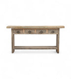 A rectangular recycled wood console table with four top drawers and a long bottom shelf, featuring a natural wood finish.