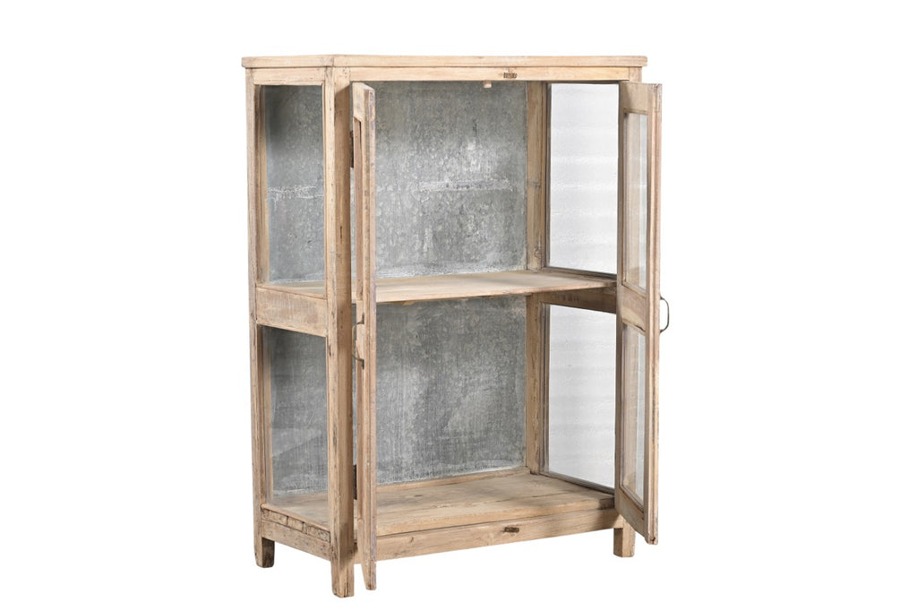 A reclaimed wood display cabinet with glass panel doors and an iron sheet backing.