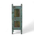 A vintage reclaimed wood glass display side cabinet with an aged turquoise finish and hints of soft green and faded yellow.