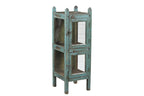 A vintage reclaimed wood glass display side cabinet with an aged turquoise finish and hints of soft green and faded yellow.