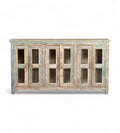 A recycled wood sideboard with glass panels on the doors and a multicolor finish.