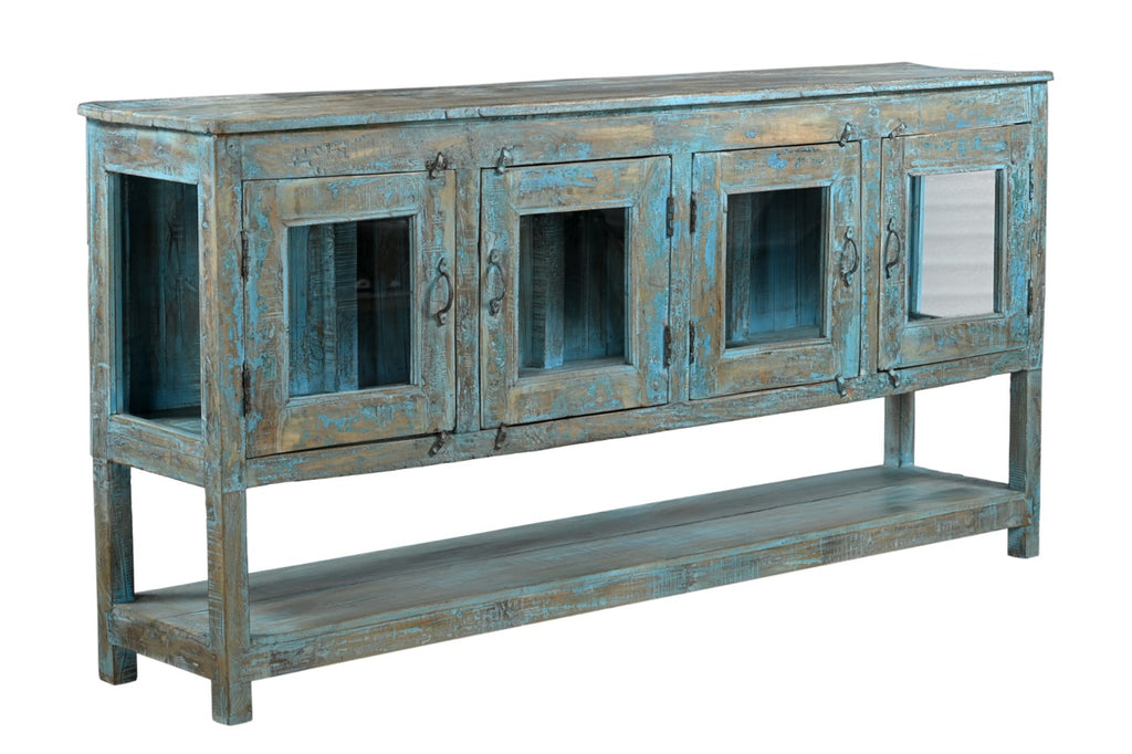 A vintage recycled wood glass sideboard with blue and multi-colour hand painted finish, featuring four glass front doors and a long shelf beneath.