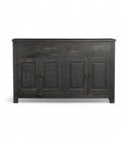 A black, mango wood sideboard with four drawers and a cracked patina finish.