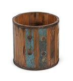 Wooden planter with a multi coloured rustic design.