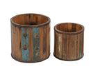 Two wooden planters with a multi coloured rustic finish
