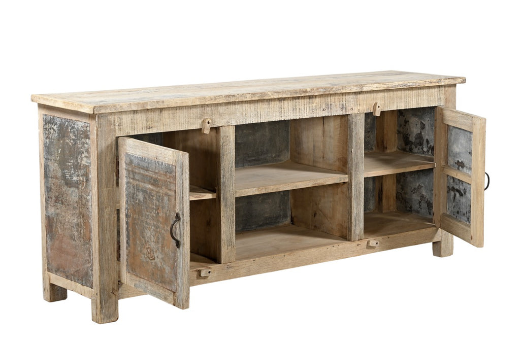 A sideboard made of Indian recycled wood with iron sheets on the doors, featuring internal compartments and a shelf.