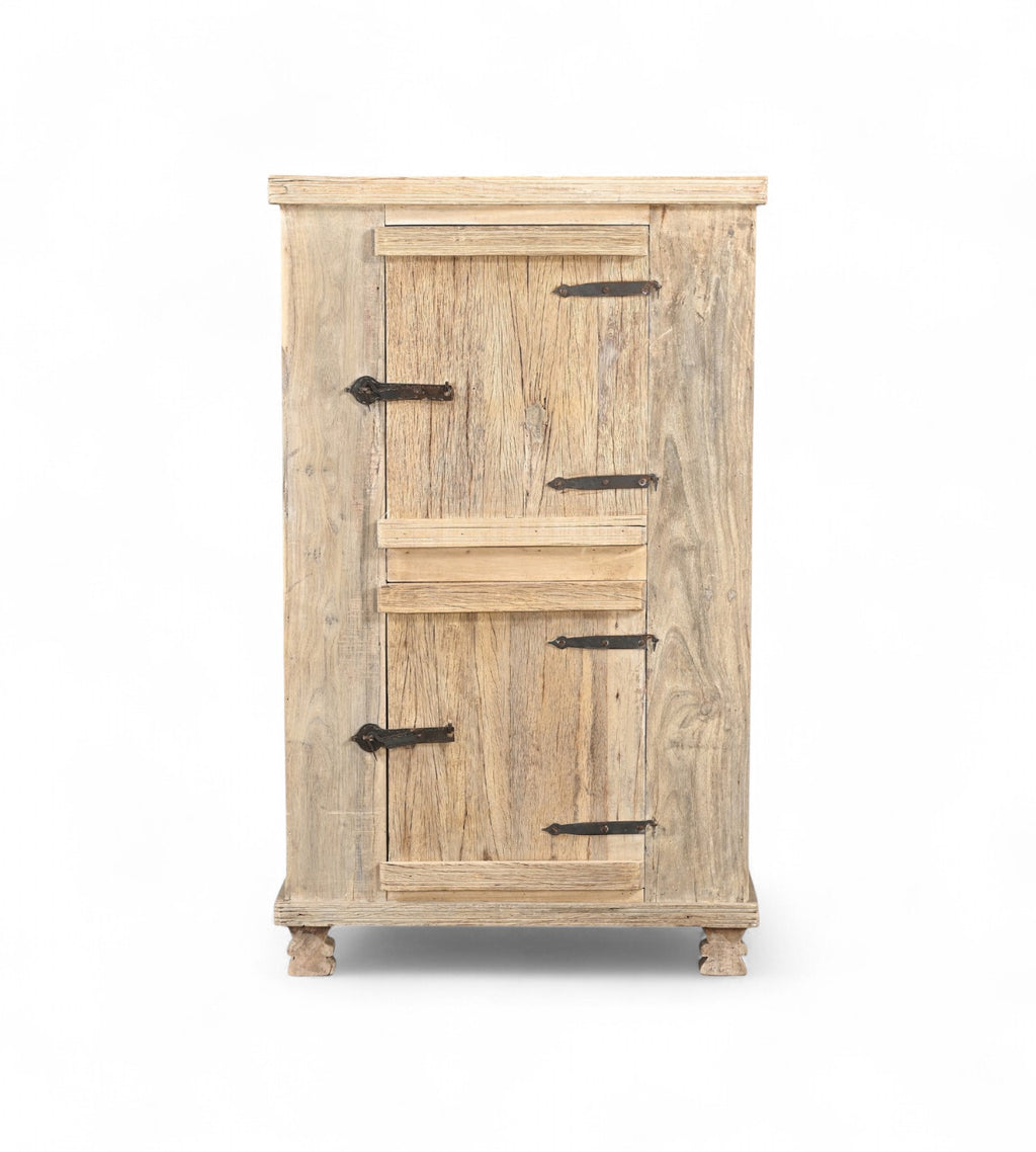 A recycled wood side cabinet with solid doors and forged iron details, featuring a natural wood grain finish.
