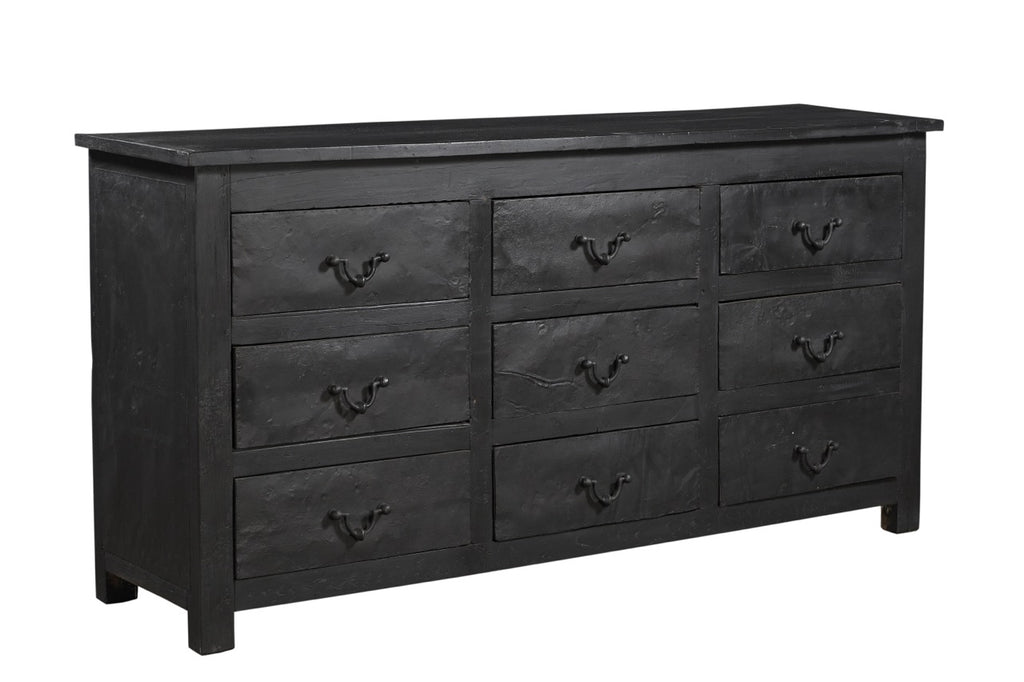 A vintage black teak wood 9-drawer chest of drawers with iron sheets pasted over the front.
