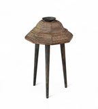 Carved teak candle holders on top of 3 legs