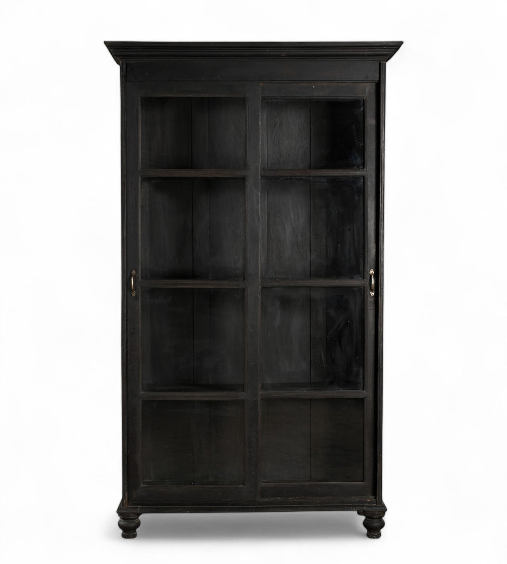 A vintage teak wood glass cabinet with black and brown tones, featuring sliding doors and a timeless design.