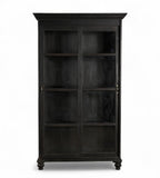 A vintage teak wood glass cabinet with black and brown tones, featuring sliding doors and a timeless design.