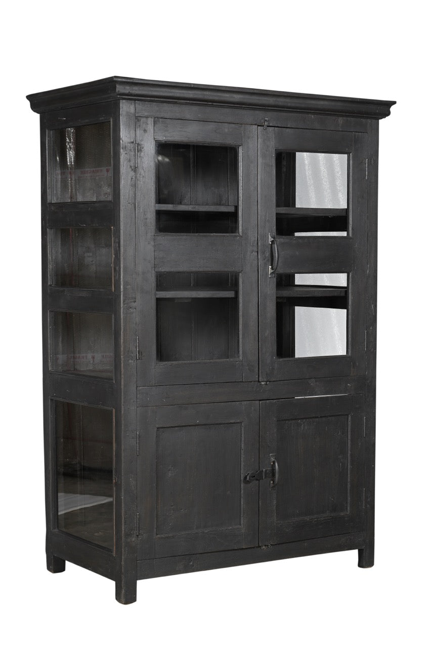 A vintage teak and glass display cabinet with black finish, featuring glass panelled upper doors and teak lower doors with an iron latch.