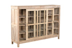 A vintage teak wood glass display cabinet with two doors and a flat top, featuring a warm brown finish