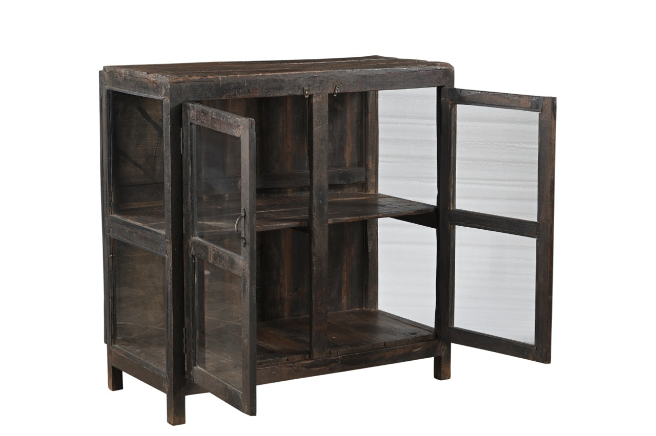 A vintage teak wood glass display side cabinet with a black brown finish.