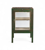 Vintage Indian teak wood cabinet with glass panels and green weathered patina finish, one internal wooden shelf, featuring brass handle hardware.