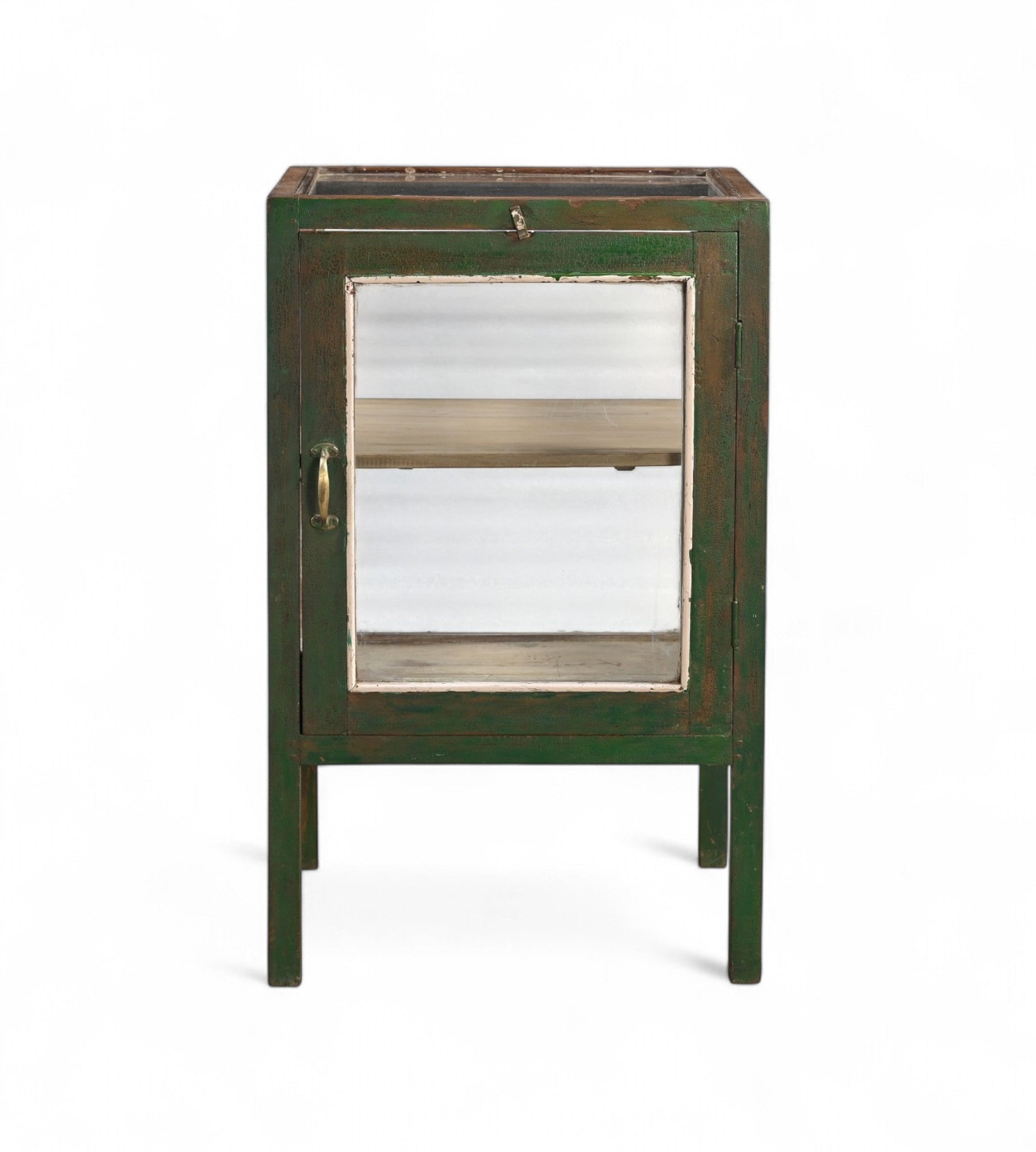 Vintage Indian teak wood cabinet with glass panels and green weathered patina finish, one internal wooden shelf, featuring brass handle hardware.