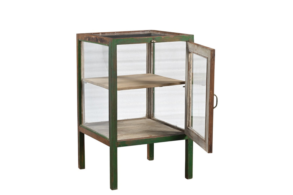 Vintage Indian teak cabinet with glass sides and green weathered patina finish, featuring brass handle hardware.