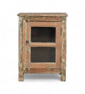 A vintage teak wood side cabinet with a weathered frame, a glass door, and a metal pull ring