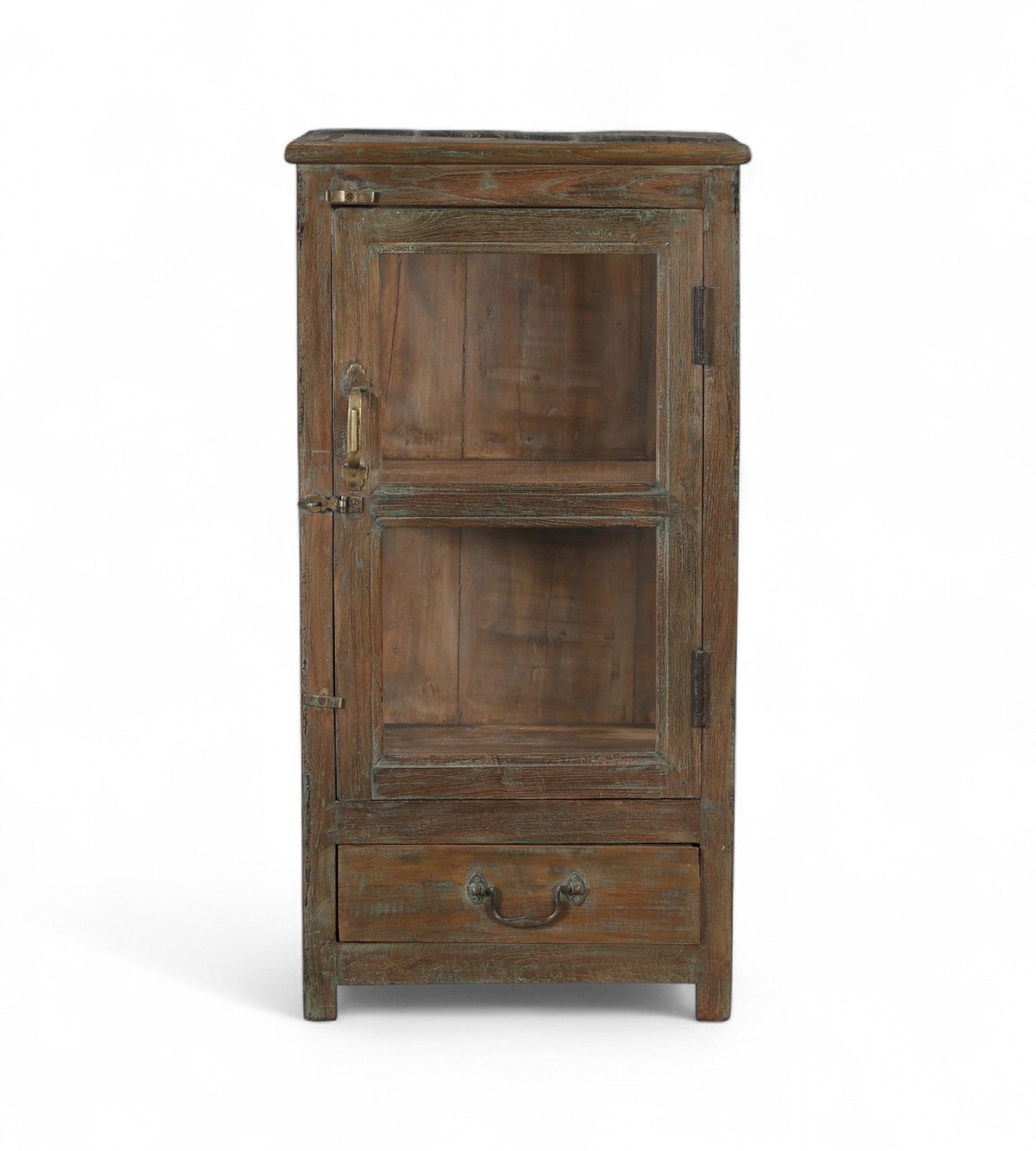 A vintage teak wood side cabinet with a glass display door and a drawer, showing a brown and green patina.