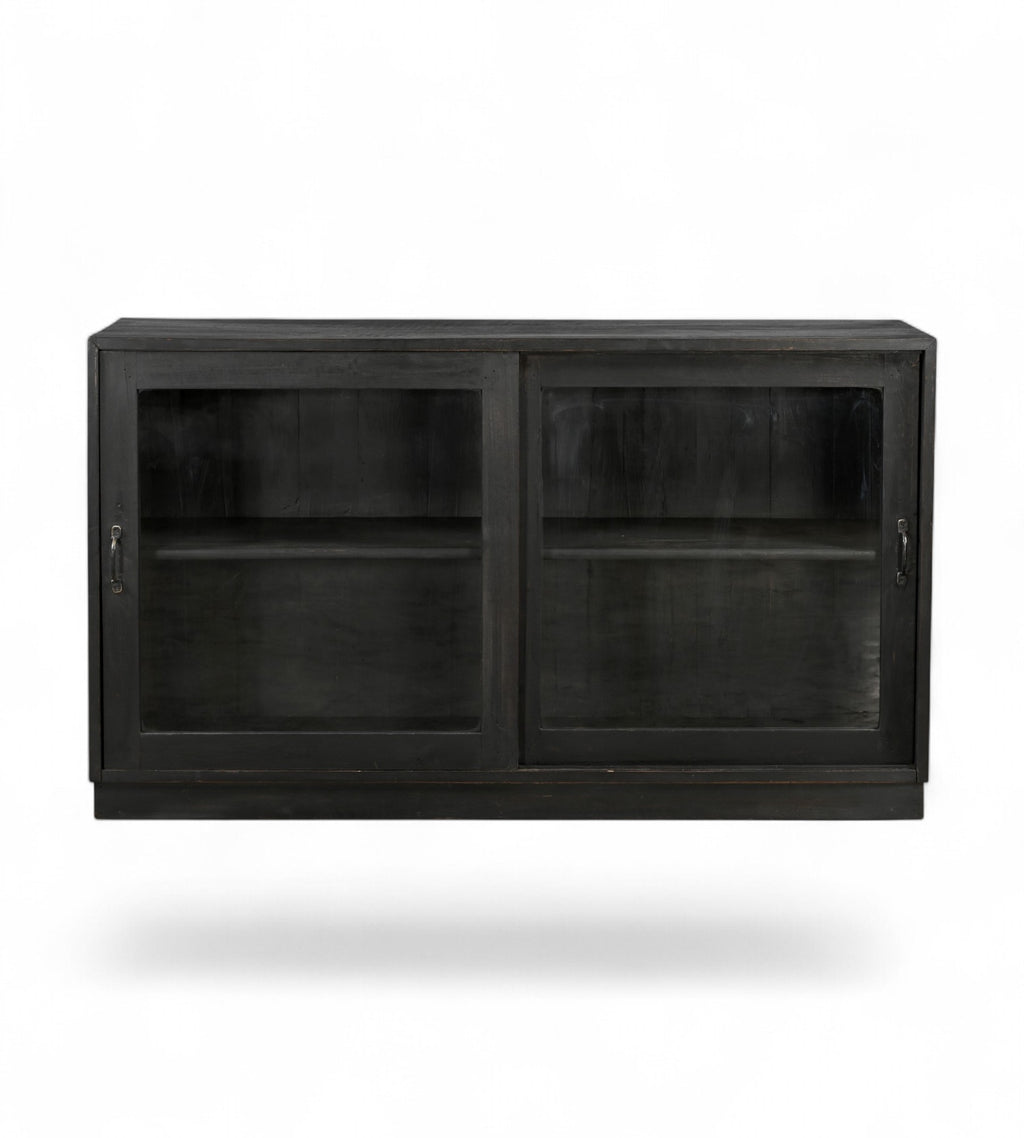 A vintage teak wood kitchen wall cabinet with two sliding glass doors and a fixed shelf inside, designed for storage.