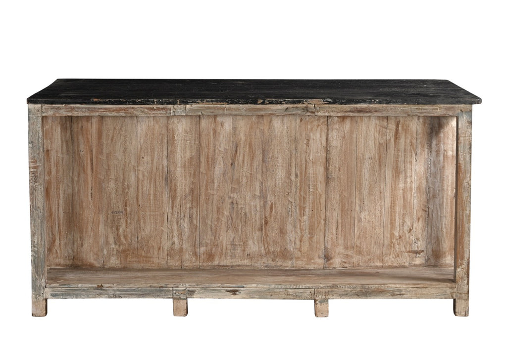 A vintage teak wood kitchen cabinet / kitchen island with glass panels on the cupboards, featuring a dark wood tabletop and an aged green and white patina finish.