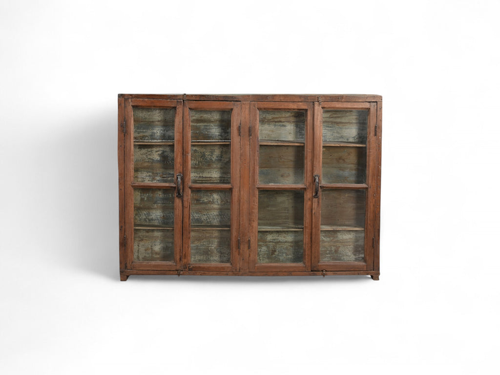 A vintage teak and recycled wood glass cabinet with a teal-grey finish on the back and sides.