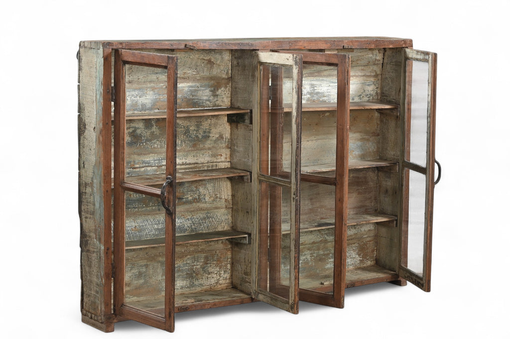 A vintage teak and recycled wood glass cabinet with a teal-grey finish on the back and sides.