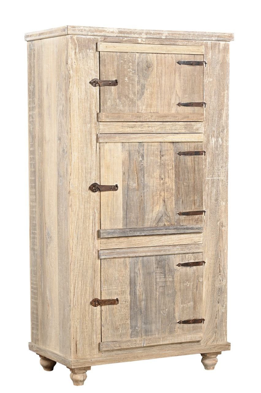 A wooden side cabinet with three panelled doors and rustic iron handles, with a sun finish highlighting the natural wood grain.