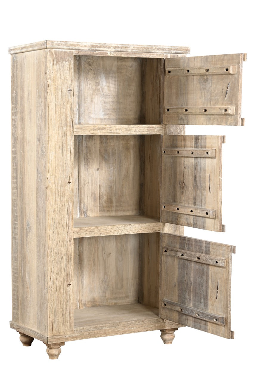 A wooden side cabinet with three panelled doors and rustic iron handles, with a sun finish highlighting the natural wood grain.
