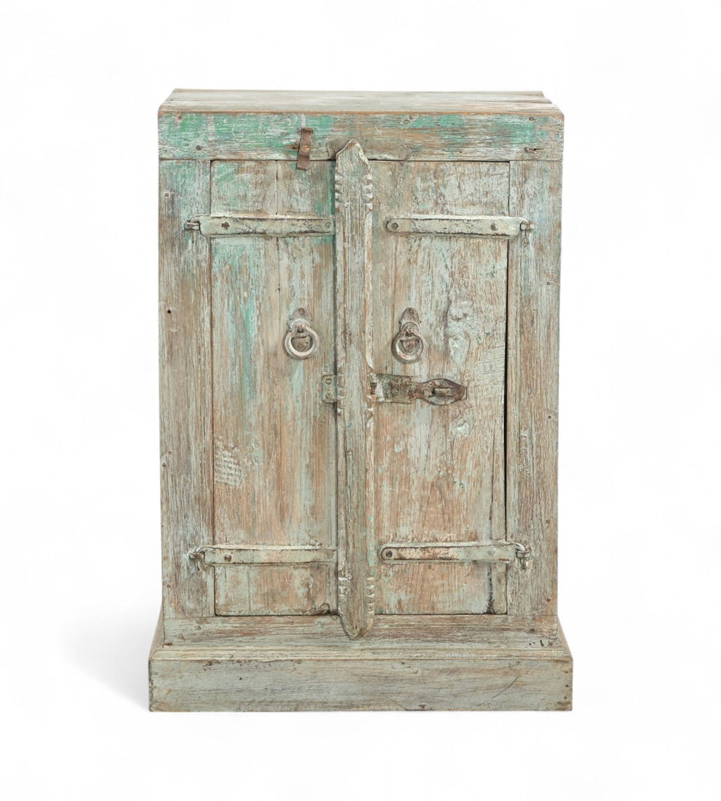 A vintage teak and reclaimed wood side cabinet with iron hardware and a weathered green patina paint finish.