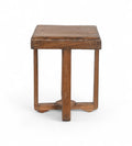 A vintage teak wood side table with a geometric cross brace design at the base.