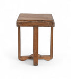 A vintage teak wood side table with a geometric cross brace design at the base.
