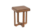 A vintage teak wood side table with a geometric cross brace design at the base.