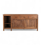 A vintage teak wood sideboard with three drawers, sliding doors, and open shelving on one side.