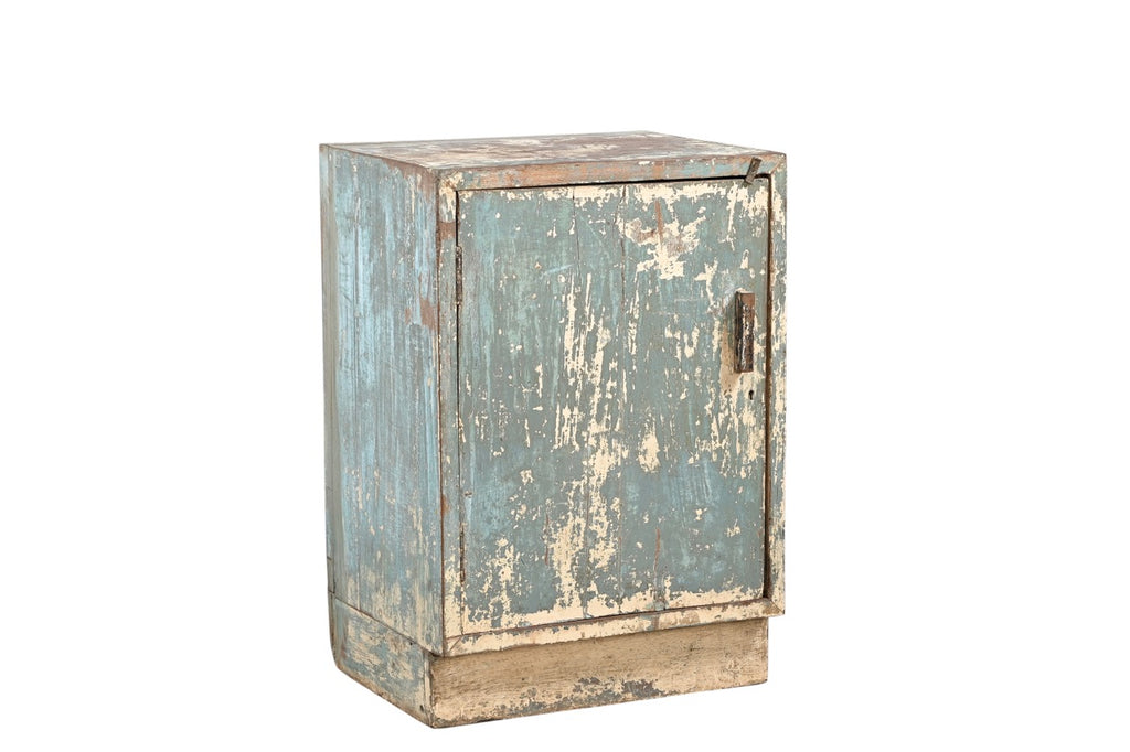 A vintage teak wood bedside table with a worn blue paint finish