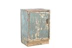 A vintage teak wood bedside table with a worn blue paint finish