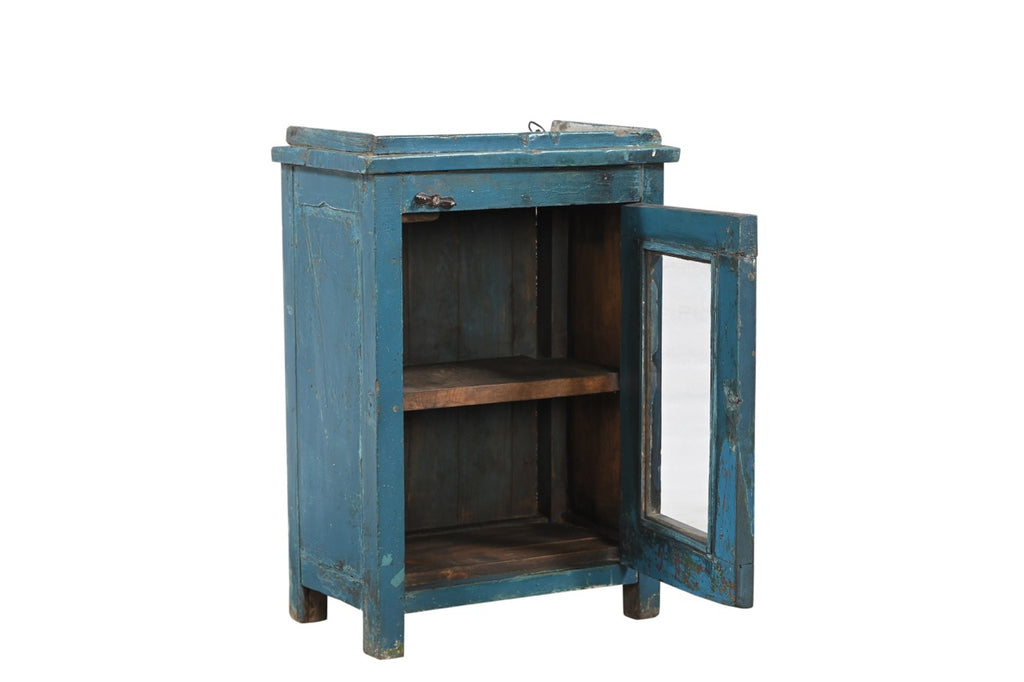 A vintage teak wood side cabinet with a blue painted exterior, iron hardware, and a glass front door.