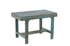A rectangular vintage teak wood side table with a faded blue finish.