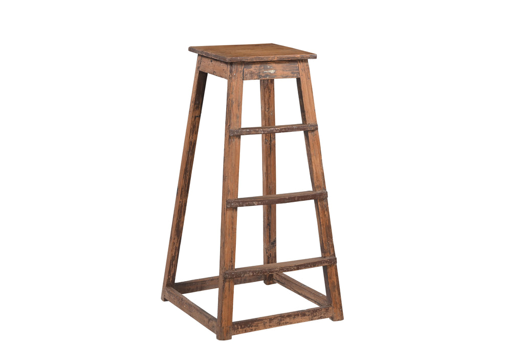 Wooden bar stool with a rustic design
