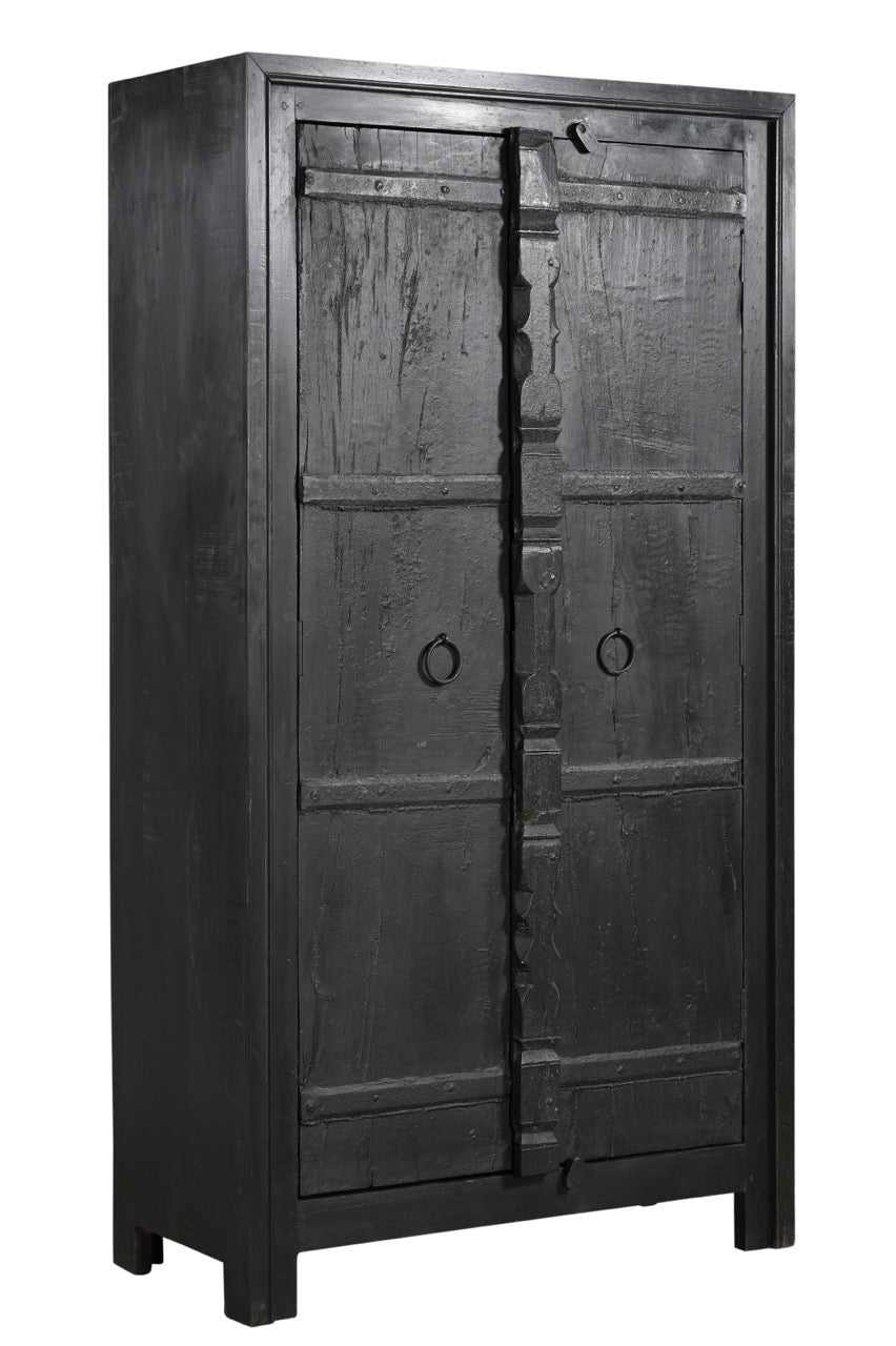 Vintage teak wood cabinet wardrobe with hand carved central spine and iron pull rings, in a black finish.