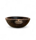 Wooden teak bowl with a metal handle on a white background